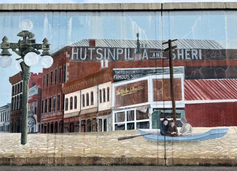  The floodwall in Ironton documents the town's history through art. This mural shows the town in the aftermath of a flood in 1937.