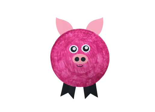 Paper plate cut out of a pink pig. 