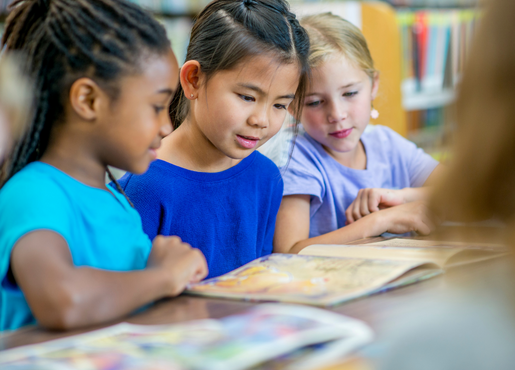 3 children reading 