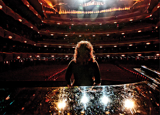 woman standing on a stage