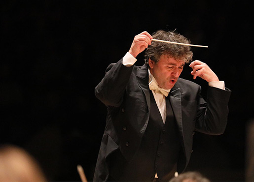 man conducting 