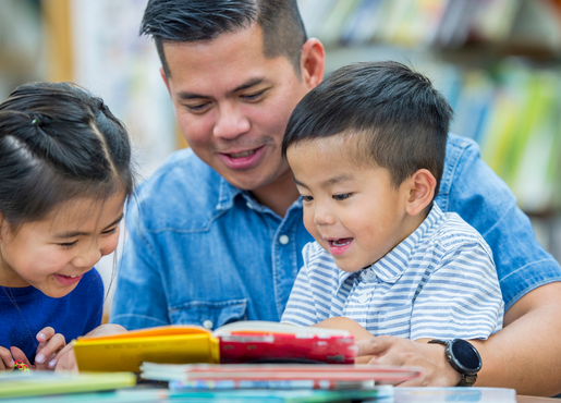 kid doing crafts with dad