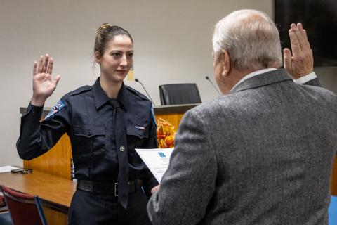  Beavercreek Mayor Bob Stone swears in Officer Taylor Smart in November of 2022. She is one of the first graduates of the College to Law Enforcement Pathway Program.