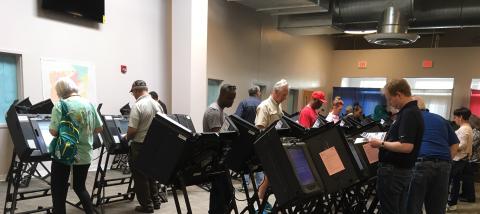 Voters cast ballots at the Franklin County early voting center in Columbus the weekend before the election in 2018.