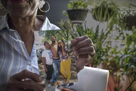  Debra Headen holds a picture of her grandson, Deonte Baber.