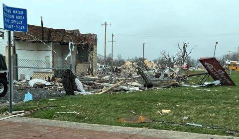 The sign for Steve Austin's auto shop was toppled by a tornado that swept through the Indian Lake area on March 14.