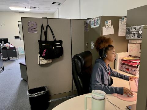 The Talbert House in Cincinnati is one of 19 call centers across Ohio manning the state's 988 suicide prevention line. An operator awaits a call at her desk.