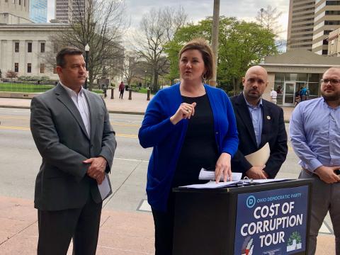 Liz Walters, Ohio Democratic Party chair, with candidates for statewide office outside the Ohio Statehouse in April 2022.