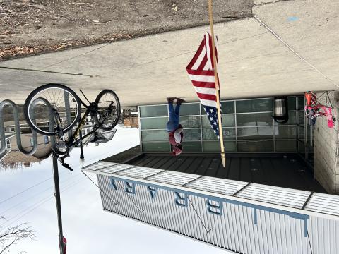 A poll worker waits for voters outside a precinct in North Columbus.