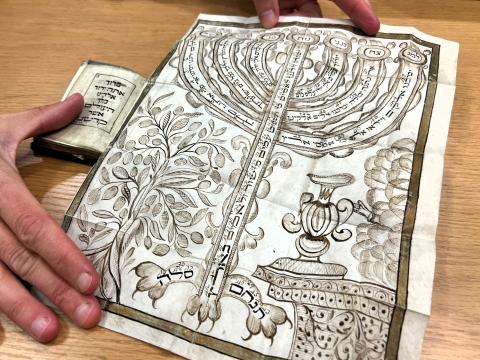 A page in a rare book at the American Jewish Archives in Cincinnati shows an intricate menorah.