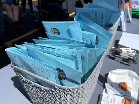 At a drive-thru event in the Youngstown suburb of Austintown, the Mahoning County prosecutor's office worked with local librarians, police officers and the Mahoning County Board of Developmental Disabilities to distribute blue envelopes like this. The program aims to improve communication between people with disabilities and law enforcement.