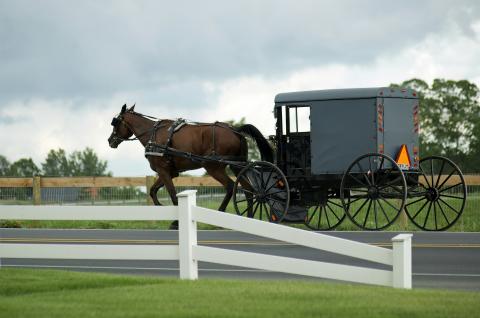 Many members of Ohio’s Amish community have been using orange slow moving vehicle emblems and flashing lights on their buggies for years. But some conservative members of the community have resisted adopting the safety features, arguing they violate their religious beliefs and traditions.