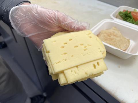 Swiss cheese gets its characteristic holes from the emission of gas by prokaryotic bacteria.