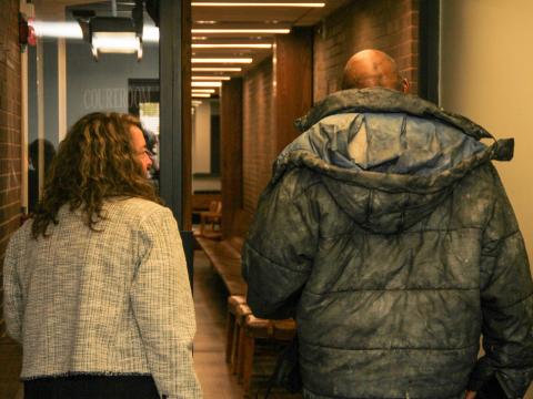 Newark Assistant Law Director Melanie Timmerman, left, walks with Bobby Kelley, the defendant in Licking County's first HOME Court case, in May. The new diversion court is aimed at helping nonviolent offenders who are experiencing homelessness.