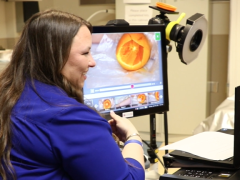 Sheree Ford, associate manager of forensics at OhioHealth, demonstrates how the hospital system's new Cortexflo cameras work.