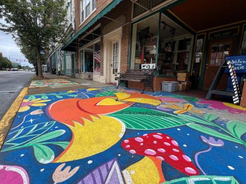Murals like this decorate sidewalks in Portsmouth. They're products of the Trillium Project, a nonprofit organization working to revitalize the community with art.