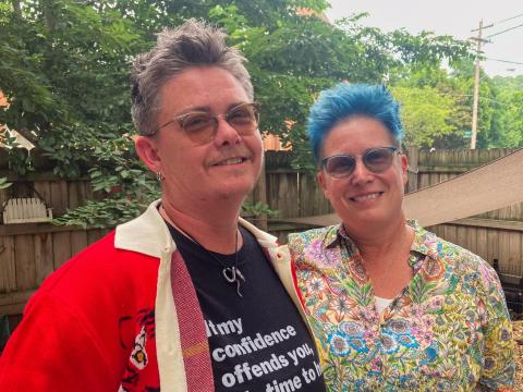 Tristan Vaught with their wife, Patti Ewald, on Monday, July 14, 2025. A conversation with Ewald gave Vaught the courage to begin transitioning.