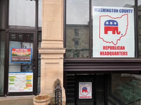 A sign posted on a Marietta building says, "No More Injection Wells in Washington County." Some residents in the area are concerned wastewater from injection wells could get into the local drinking water supply. In a bipartisan move, the city passed a resolution asking the state to pause injection well activity in the area.