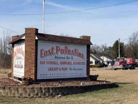 A sign welcomes visitors to East Palestine. The Ohio village was the site of a massive train derailment on Feb. 3, 2023.