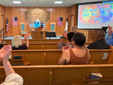 Worship at Miami Valley Baptist Church for the Deaf in North Dayton. The sound system is intentionally loud so the mostly deaf congregation can feel the vibration of the music.