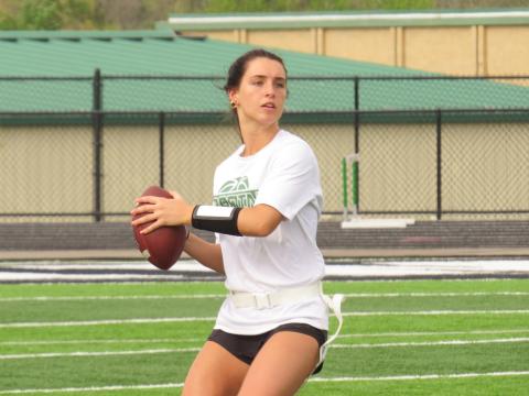 Badin's Hailey Weber drops back to pass during an afternoon practice.