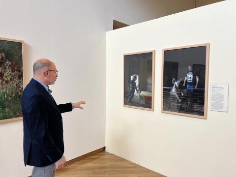 Two portraits depict the Cordrey family and their livestock on Summe Farm in Oxford.