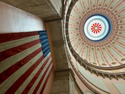 An American flag decorates a space beneath the rotunda of the Ohio Statehouse.