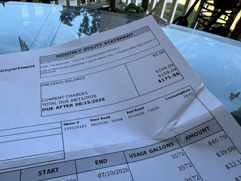 Andrea Tomer-Lewis' water bill for her home in Cadiz, Ohio. She says she has been paying more over the last year than previously.