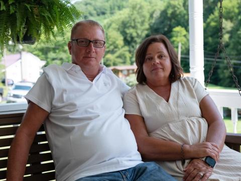 Like many miners with advanced black lung disease, Tim Balthis looks healthy, sitting with his wife Fran Balthis on their porch in Pound, Va. But a scan of his lungs shows so much fibrotic tissue a doctor told Balthis he was surprised he was still alive.
